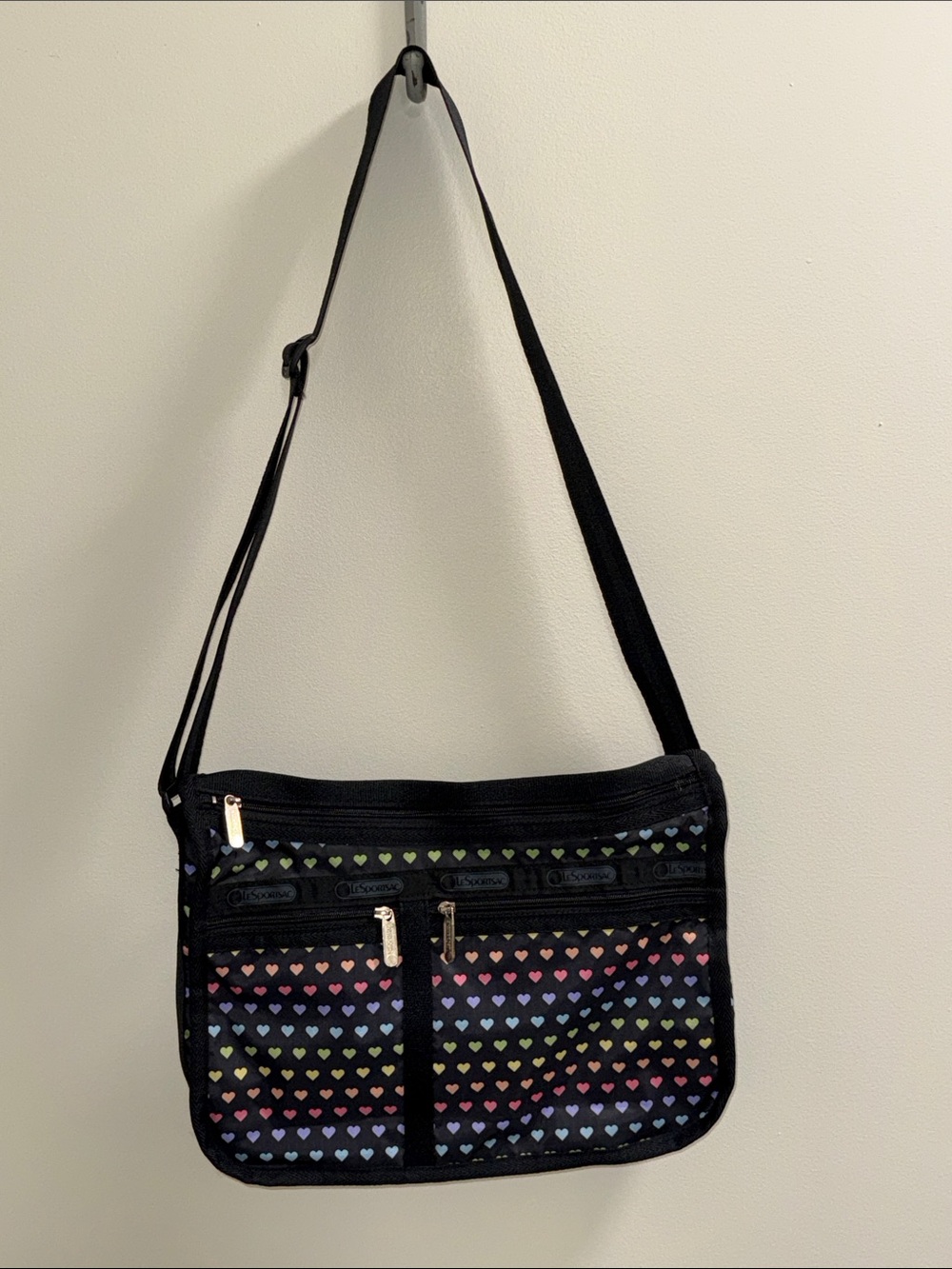 LeSportsac Black Crossbody Bag with Multi-Color Heart Print